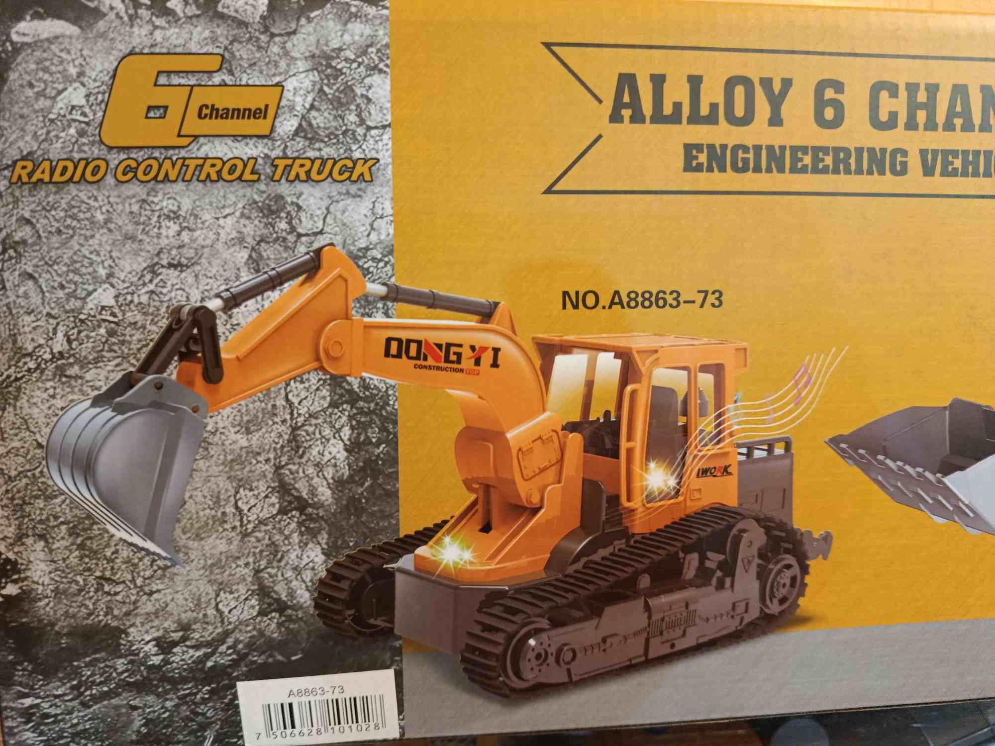 Máquina con garra, juguete a control remoto